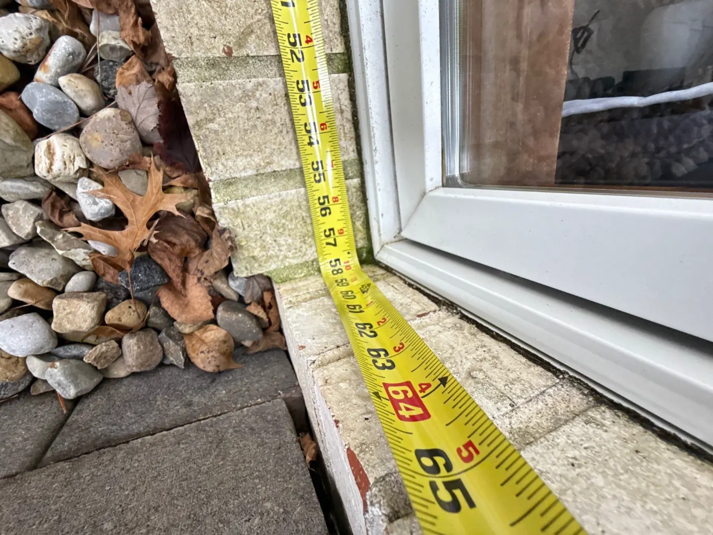 Storm-damaged window documented in Whitestown